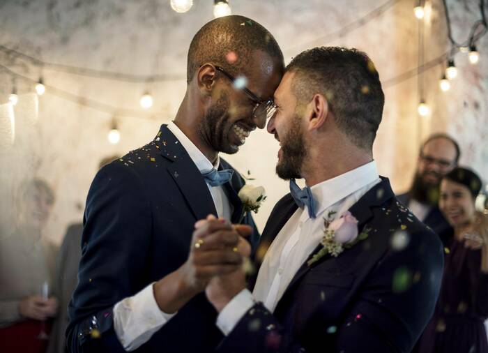 male couple after wedding